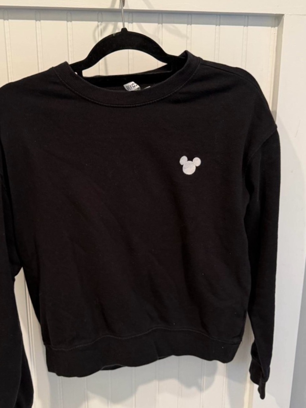 Divided Black Sweatshirt with Small White Disney Mickey Patch